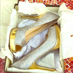 Enzo A.  9 silver gold platform peep toe pumps